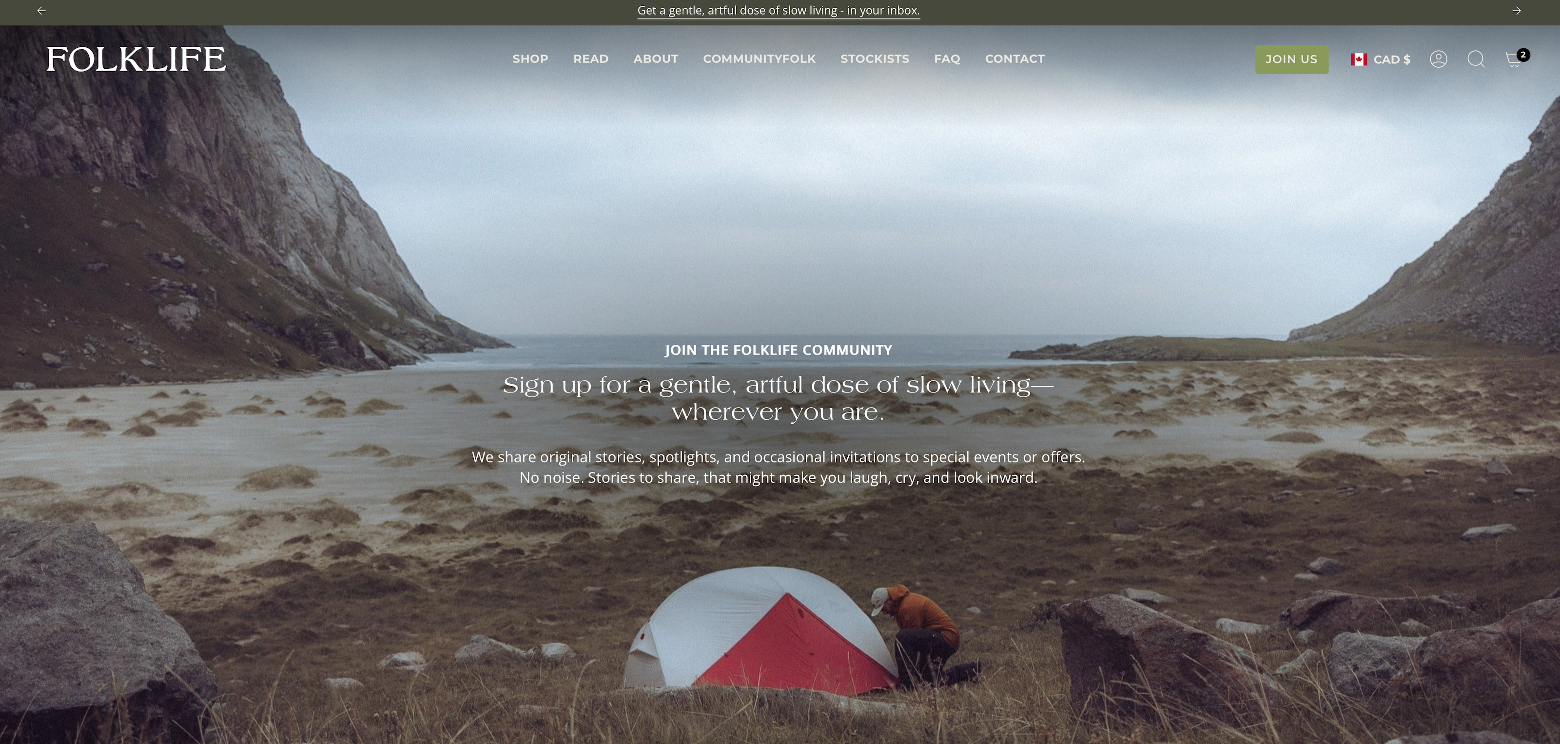 The new sign up page for FOLKLIFE's digital newsletter, featuring a self portrait, camping on the rugged coast. Photo by Saman Rezapour