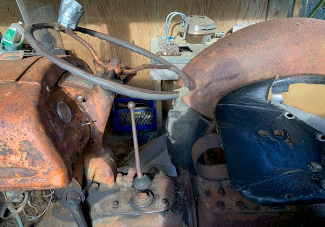 Rust-covered machinery with a focus on mechanical components.