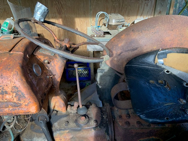 Rust-covered machinery with a focus on mechanical components.